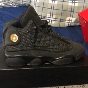 Air Jordan 13 “black cat”